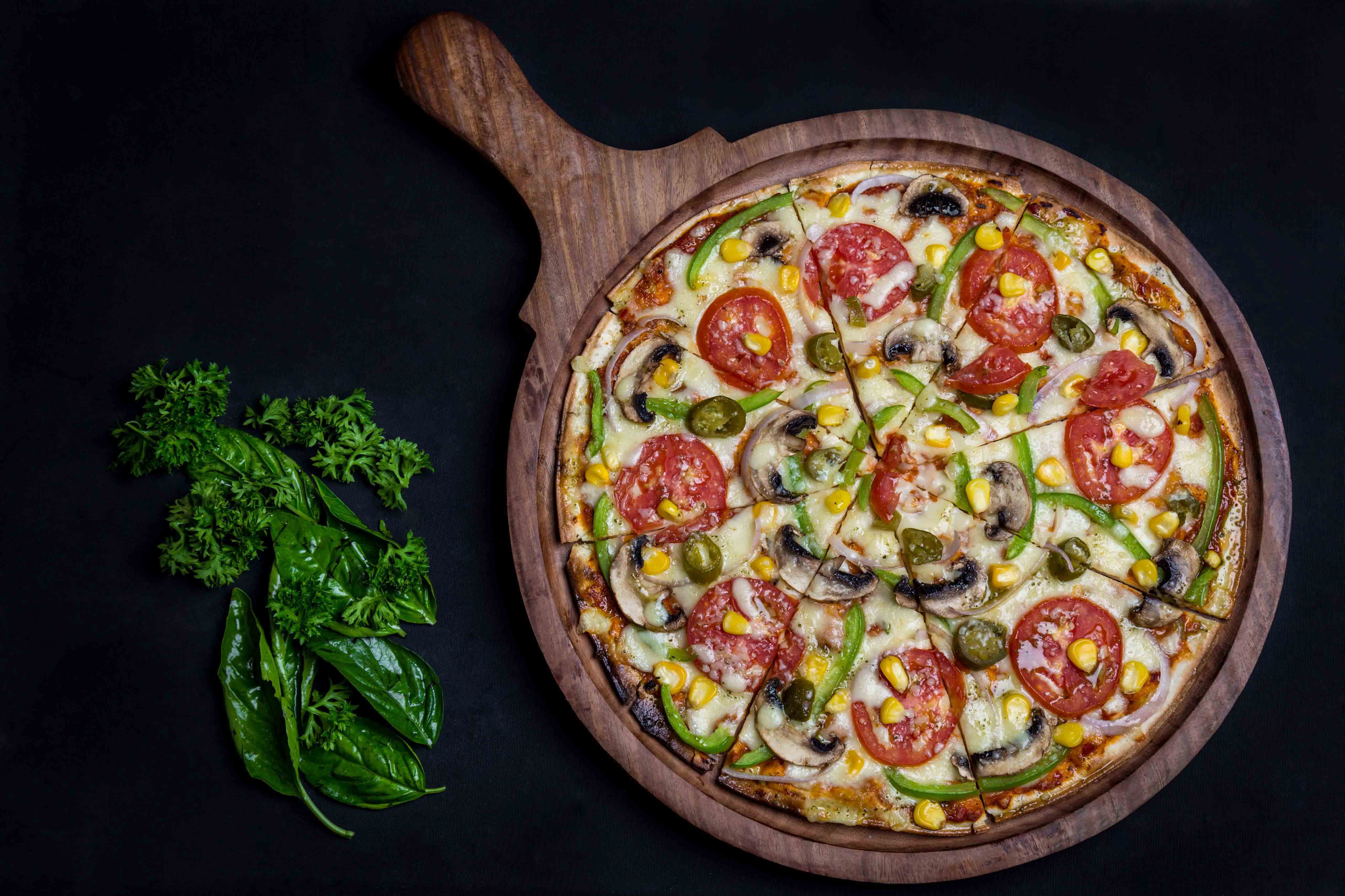 Professionally photographed picture of a wood over farmhouse pizza